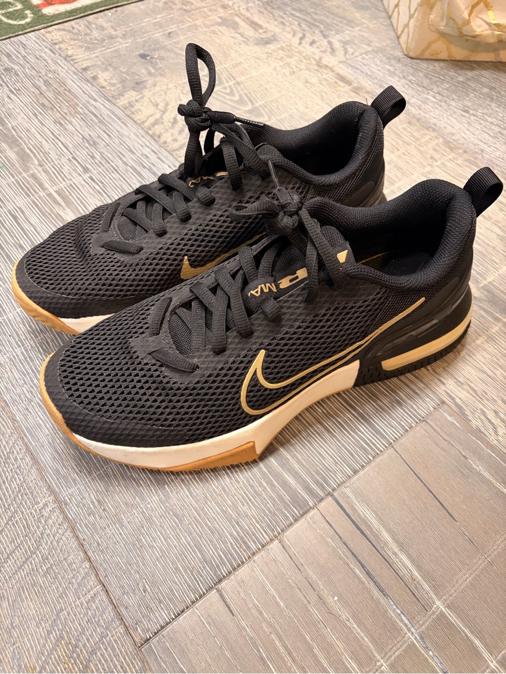 Nike Men’s Black and Gold Training Sneakers